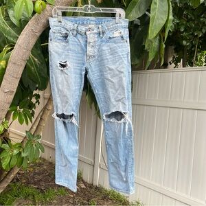 NSF Light Blue Straight Slouch Jeans in a Distressed Style.